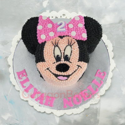 smiling minnie hand piped cake
