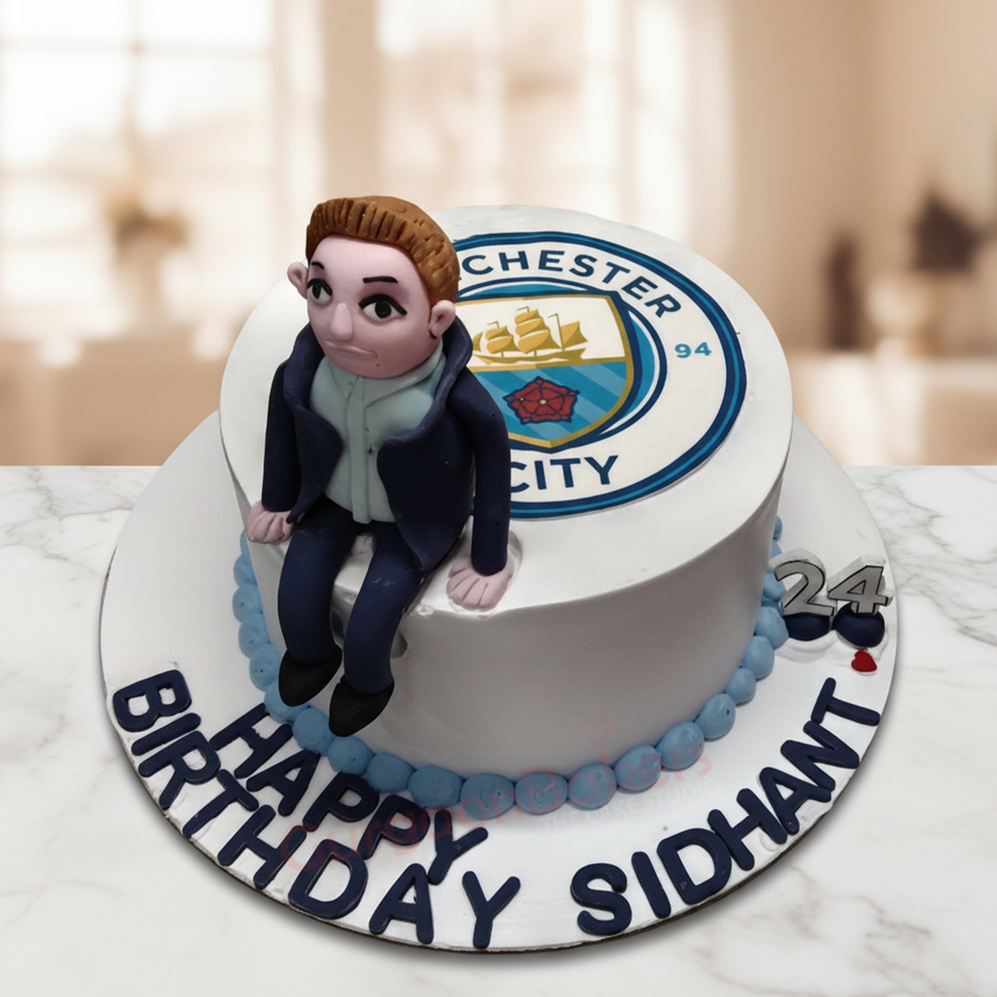 Football Fan Cake Football fan cake with a Manchester City theme celebrating a birthday
