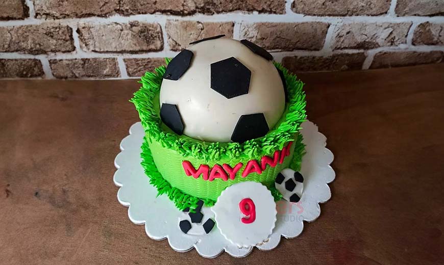 2. Football Pinata Cake
