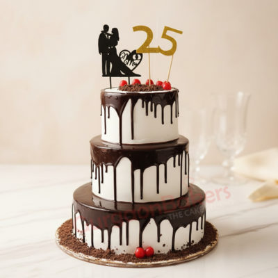 Three-tiered chocolate wedding cake with a drip design and decorative elements.