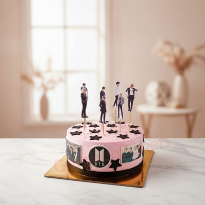 BTS themed celebration cake with figurines