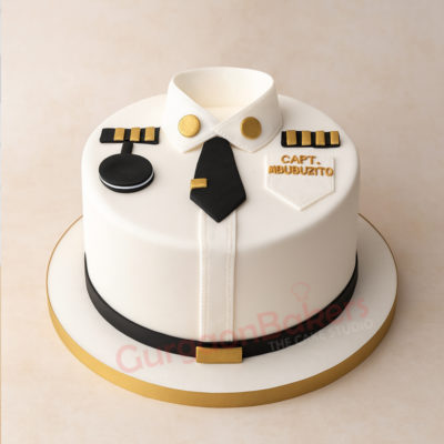Beautiful 'cake for pilot' designed like a pilot uniform with gold accents
