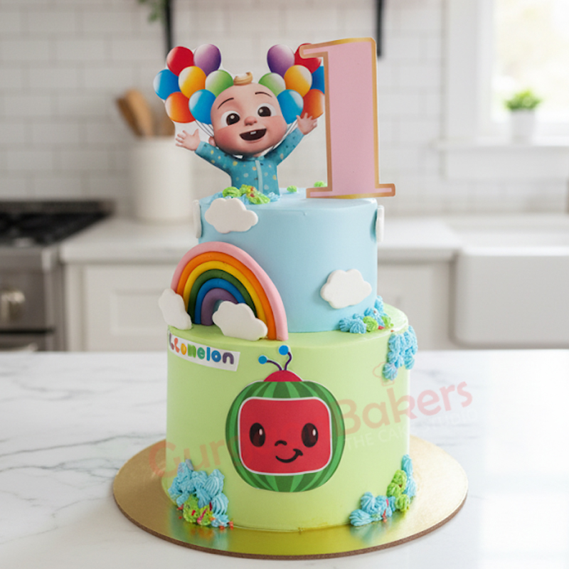 cocomelon_cake_gurgaon Vibrant Cocomelon cake for a child's birthday with balloons and rainbows