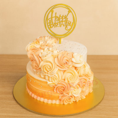 Flower cake for mom with pastel roses and a golden birthday topper