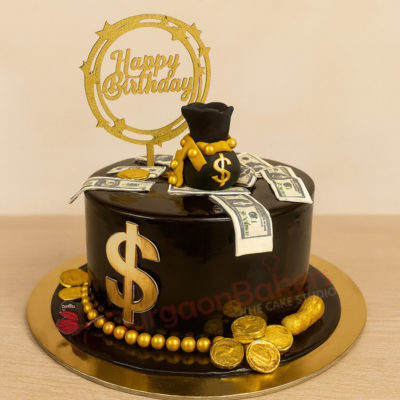 A stunning black birthday cake decorated with gold dollar signs, fondant money bags, and a 'Happy Birthday' topper