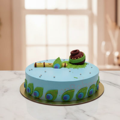 Hanmashtami Celebration Cake with peacock feathers and pot