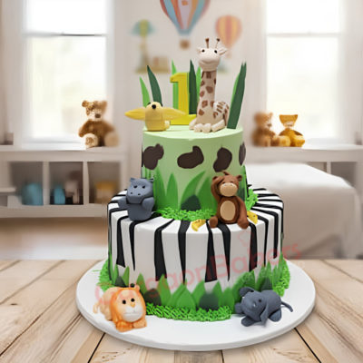 A beautifully crafted jungle theme cake featuring colorful fondant animals and vibrant decorations.