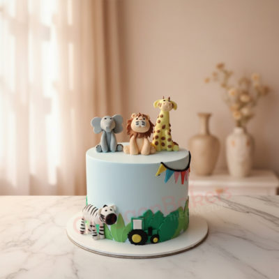 A beautifully crafted jungle-themed cake topped with playful animal figurines