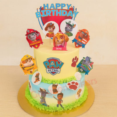 Colorful and fun Paw Cake with Paw Patrol theme decorations