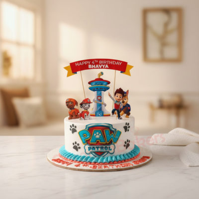 Colorful Paw Patrol birthday cake with characters and decorations
