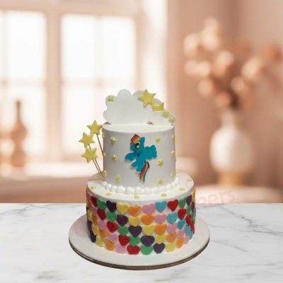 Colorful unicorn themed two-tier cake with heart decorations
