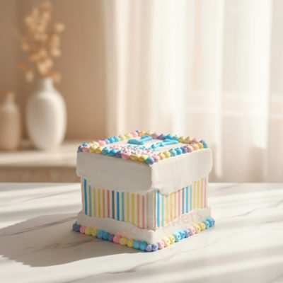 Colorful custom box cake with pastel decorations from Gurgaon Bakers