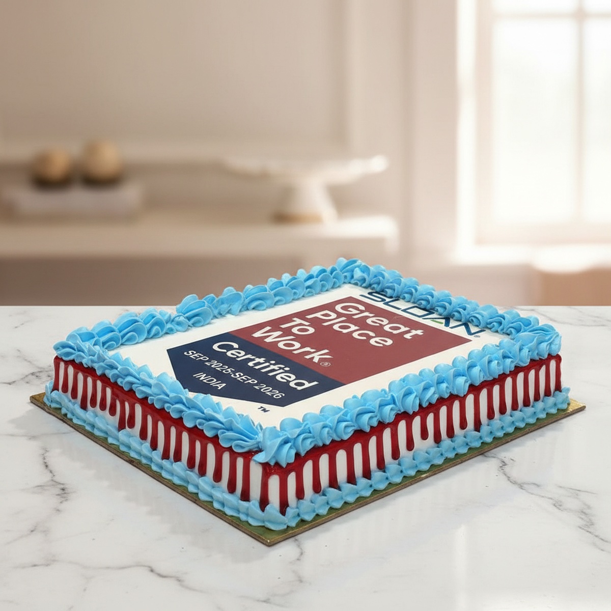 corporate-celebration-cake-gurgaon Corporate cake designed for business celebrations with blue and red frosting.