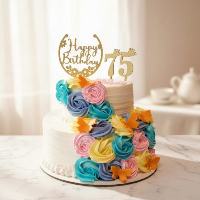Beautiful flower birthday cake with colorful rosettes and butterflies
