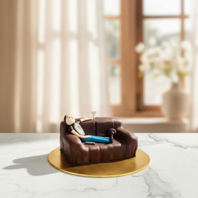 Lazy Dad Cake featuring a man relaxing on a couch