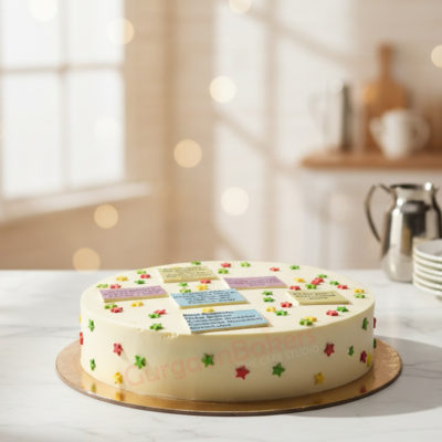 A beautifully designed farewell cake with colorful star decorations on a marble table.