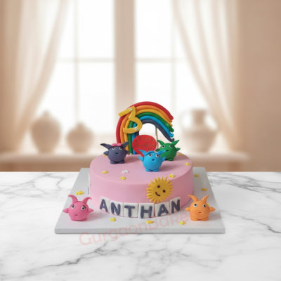 Sunny Bunnies Cake decorated with colorful bunnies and a rainbow