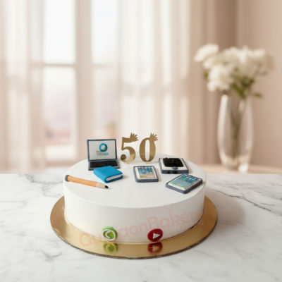 A custom 50th birthday cake for husband showcasing tech gadgets.