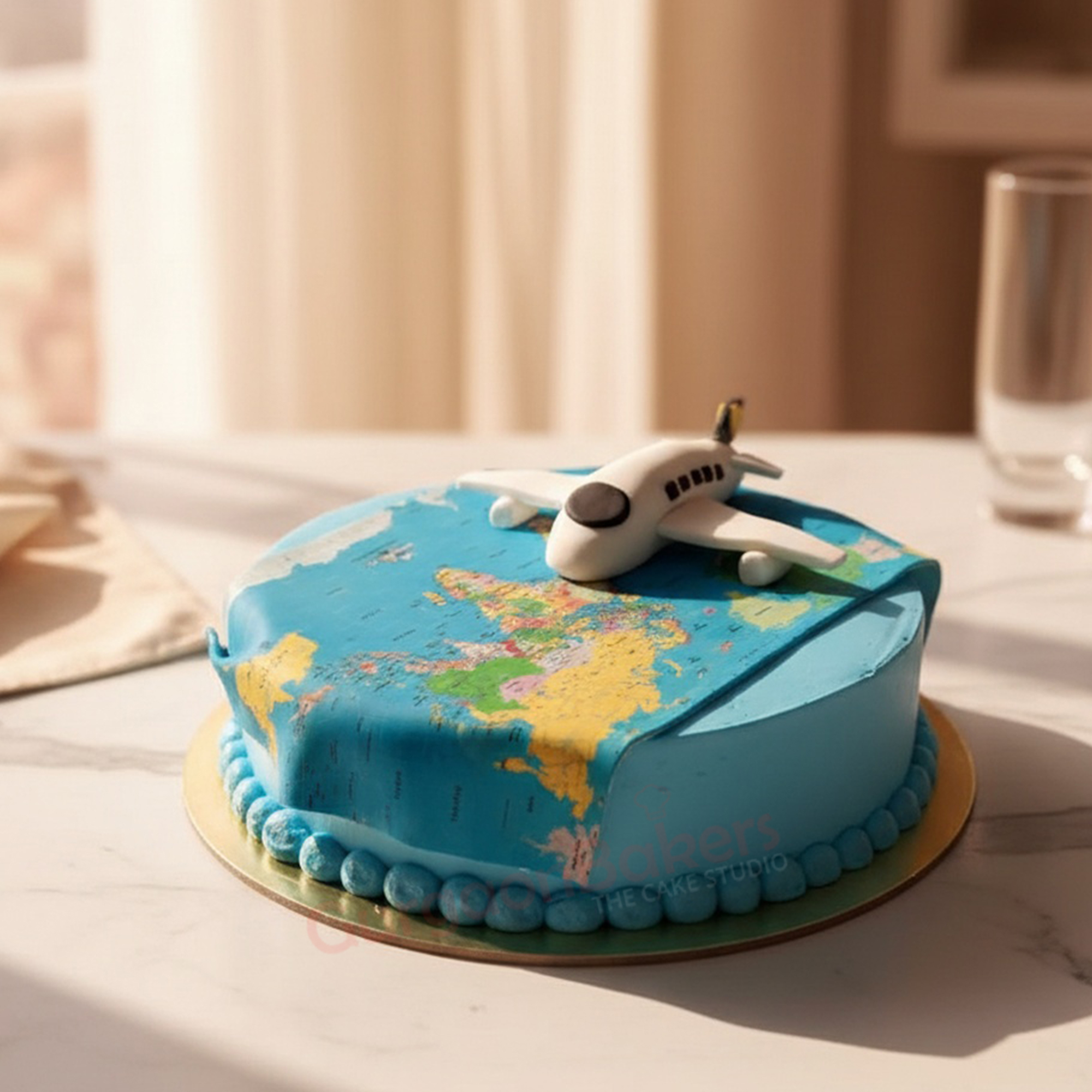 wanderlust-farewell-cake-gurgaon-bakers Wanderlust Farewell Cake with globe design and airplane decoration