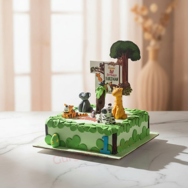 Colorful jungle-themed birthday cake with fondant animals