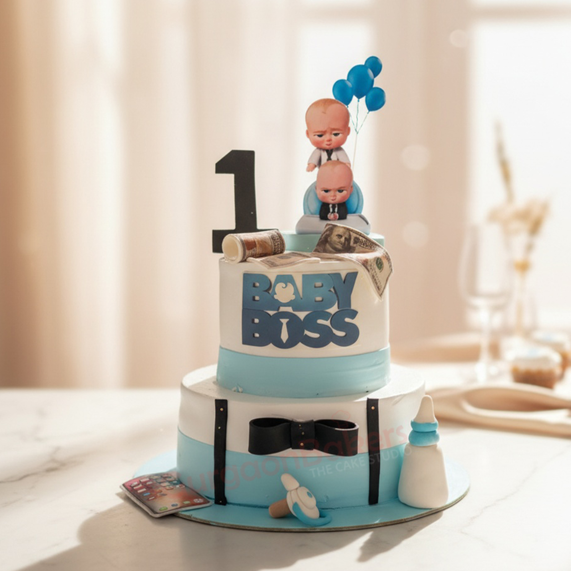 Baby Boss Birthday Cake for Boys Baby Boss birthday cake featuring a tiered design with Baby Boss figurines and playful decorations