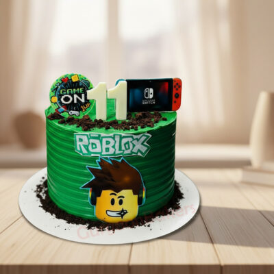 A vibrant green Roblox themed birthday cake featuring gaming elements