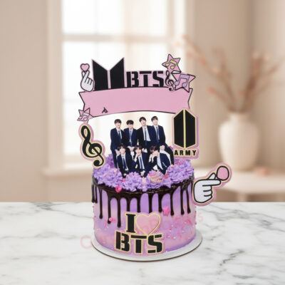 BTS Army Delight Cake with violet frosting and fun decorations