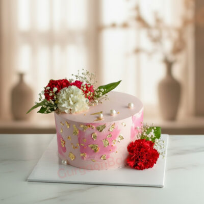 Elegant Floral Delight Cake adorned with flowers and gold accents