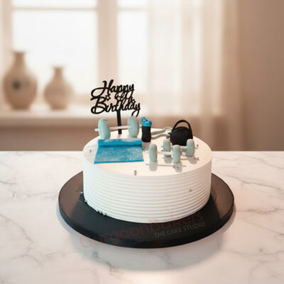 Fitness Delight Cake decorated with dumbbells and yoga mats