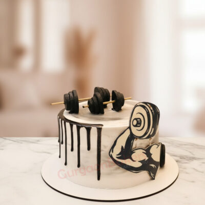 A Gym Gains Delight Cake featuring a dumbbell design for fitness enthusiasts in Gurgaon.