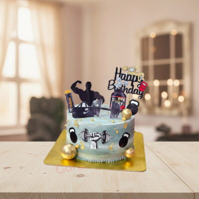 Gym-themed birthday cake with weights and fitness details