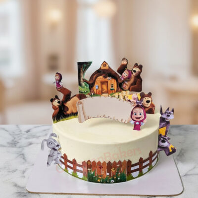 A beautifully designed Masha and the Bear cake with character toppers, created by Gurgaon Bakers