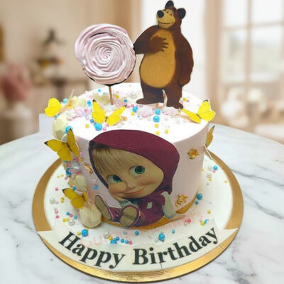 A beautifully decorated Masha Bear cake with bright colors and delicate decorations, featuring Masha and a bear surrounded by butterflies.