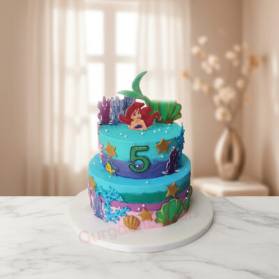A vibrant two-tier mermaid cake for a child's birthday