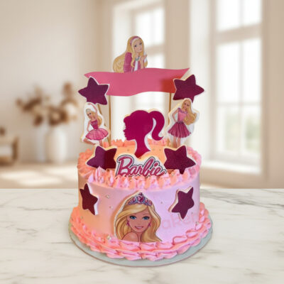 A beautifully designed Barbie theme cake featuring pink frosting and character toppers