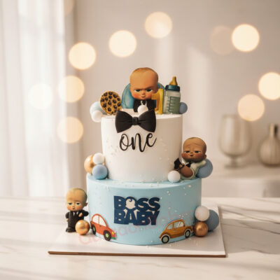 Two-tier Boss Baby theme cake featuring playful figurines and colorful decorations