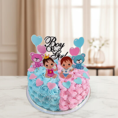 A beautifully designed Boy or Girl surprise cake with pink and blue frosting.