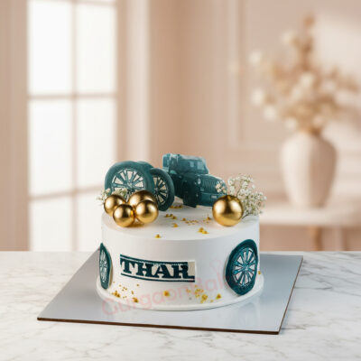 A stunning car cake designed for Thar lovers, featuring a detailed Thar model on top with decorative elements.