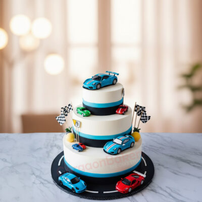 Three-tiered car theme birthday cake with toy cars and checkered flags.