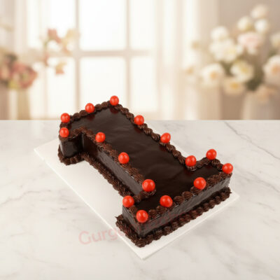 First Birthday Adventure Cake with blue frosting and decorations