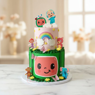 Colorful Cocomelon themed cake with vibrant characters and rainbow decorations