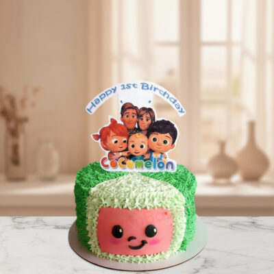 Cocomelon themed birthday cake with colorful frosting