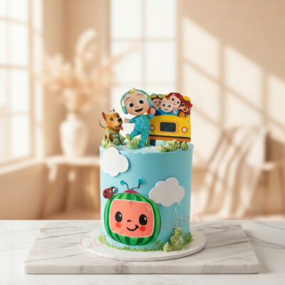 A colorful Cocomelon themed birthday cake with cartoon characters