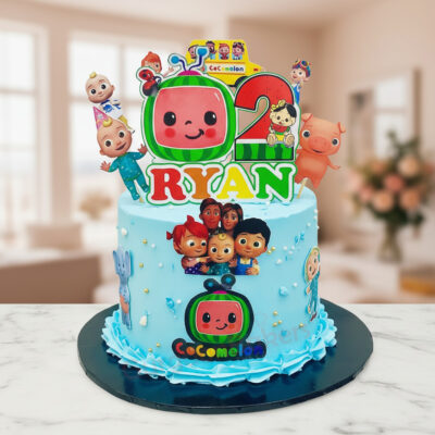 Cocomelon themed birthday cake with vibrant colors and characters