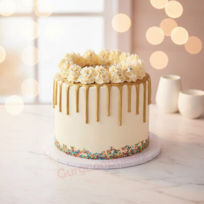 A beautifully designed golden jubilee marriage anniversary cake with floral decoration.