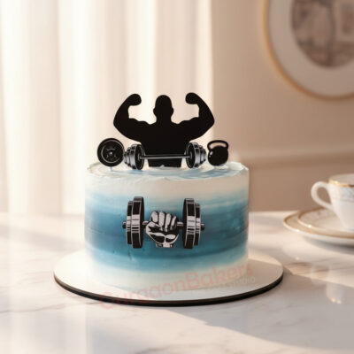Custom cake for gym lovers featuring dumbbells and kettlebells decorations
