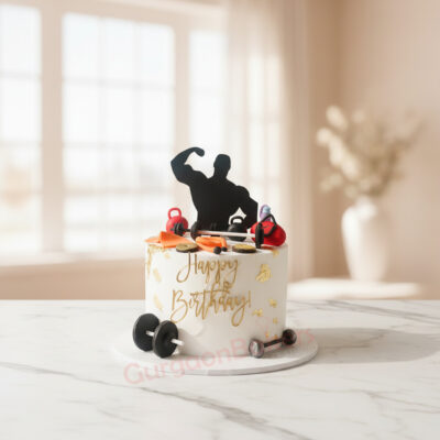 Gym theme cake with dumbbell decorations
