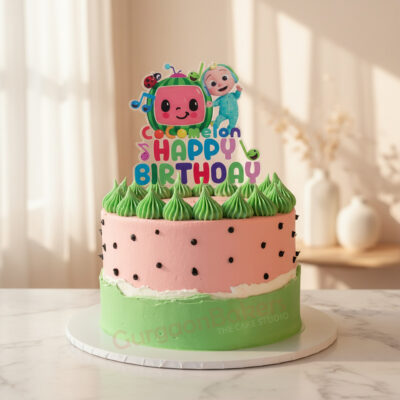 A colorful Kids Cocomelon birthday cake with green frosting and themed decoration