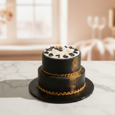 New Year themed cake with black and gold decoration