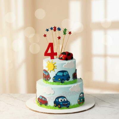 Whimsical car cake with colorful decorations for a birthday celebration
